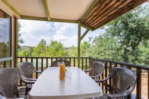 Locatif - Chalet Confort Acacia 2 Schlafzimmer - TV - 25m² + 10 m² überdachte Terrasse - Ushuaïa Villages - Camping l'Oasis *****