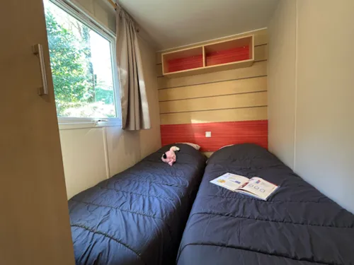 Mietunterkunft - Mobilheim Confort Titania - 2 Schlafzimmer - 25M² + 10M² Überdachte Terrasse - image n°8 - Ushuaïa Villages - Camping l'Oasis *****