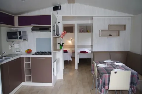 Location - Mobil-Home / 25M² - 2 Chambres - image n°4 - Camping - Caravaneige L'Oustalet