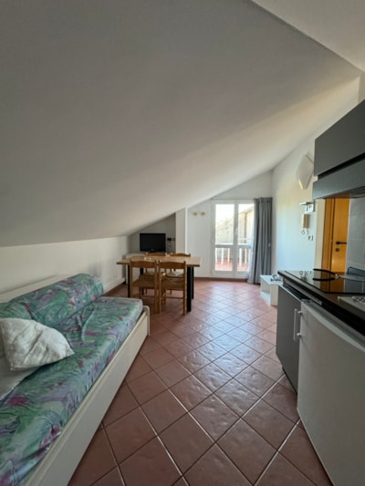 TWO-ROOM ATTIC APARTMENT — 1