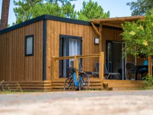 Locatif - Homeflower Premium 29m² - 2 Schlafzimmer + Halbüberdachte Terrasse + TV + Klim +Bettwäsche inklusive - Flower Camping Les Iles 