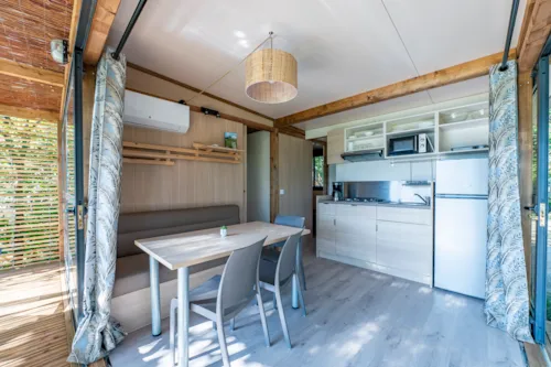 Location - Cottage Premium 2 Chambres - image n°5 - Camping Paradis Les Gorges du Haut Bugey