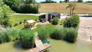 Locatif - Càbina de spa de fusta a la deriva - Camping Le Domaine des Feuilles