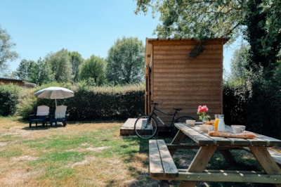 Premium pitch with private sanitary facilities and kitchenette!