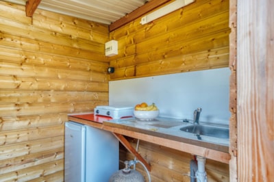 Premium pitch with private sanitary facilities and kitchenette!