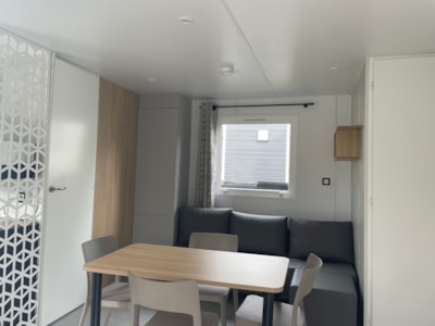Mobilhome GRAND LARGE 2 bedrooms + 1 additional bed in living room on the sofa. — 4