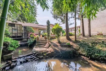 Location - Studio Avec Jacuzzi - Hôtel & Camper Le Moulin de la Brevette  