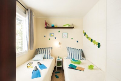Mobile-home Standard  26m² (2 bedrooms - air conditioning - TV) sheltered terrace