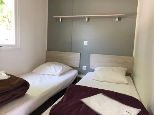 Location - Premium M.Home 4 Pers. 32M2, 2 Chambres, Salle De Bains, Wc, Grande Terrasse, Climatisation - image n°8 - Camping Le Rhône