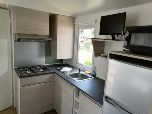 Location - Mobilhome 2 Pers. 29 M², 2 Chambres, Salle De Bain, Wc, Avec Terrasse Et Climatisation - image n°9 - Camping Le Rhône