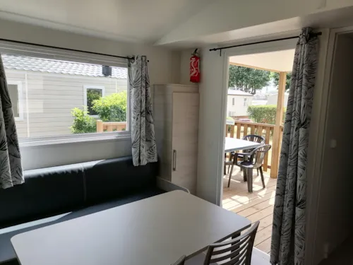Location - Mobilhome 3/4 Pers. 29 M², 2 Chambres, Salle De Bain, Wc, Avec Terrasse Et Climatisation - image n°8 - Camping Le Rhône