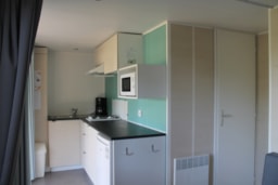 Mietunterkunft - Mobilheim Confort 16M² (1 Zimmer) + Halbüberdachte Terrasse - Camping de l'Océan