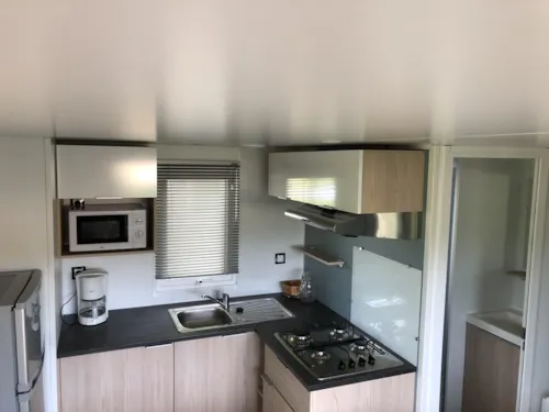 Mietunterkunft - Mobilheim Rapidhome 2018 Alizé 3 Zimmer - Halbüberdachte Terrasse + Klimaanlage + Wifi - image n°4 - International Camping