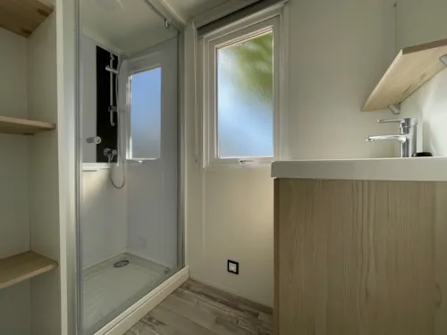 Mietunterkunft - Mobilheim Rapidhome 2018 Alizé 2 Zimmer - Halbüberdachte Terrasse - Mit Klimaanlage - image n°6 - International Camping