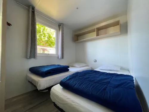 Mietunterkunft - Mobilheim Rapidhome 2018 Alizé 3 Zimmer - Halbüberdachte Terrasse + Klimaanlage + Wifi - image n°7 - International Camping