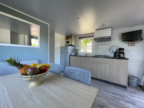 Mietunterkunft - Mobilheim Rapidhome 2018 Alizé 2 Zimmer - Halbüberdachte Terrasse - Mit Klimaanlage - image n°3 - International Camping