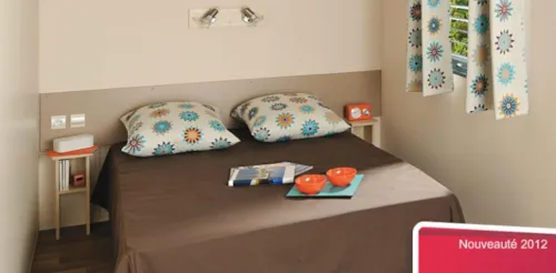 Location - Mobil Home Family 3 Chambres / Terrasse Bois Couverte / Lv / Tv / Clim Réversible / Nespresso - image n°4 - Camping Le Soleil Fruité