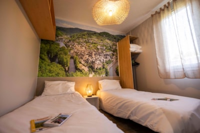 Chalet 32m² / 2 bedrooms with a large terrace overlooking the river Lot.