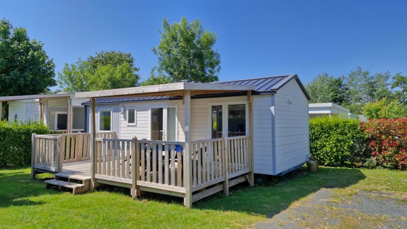 Mobilheim Confort 32m² (3 Schlafzimmer) + halbüberdachte Terrasse 10m² + TV