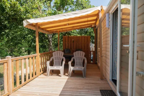 Accommodation - Mobile-Home 30M² - Comfort - 2 Bedrooms - Semi-Covered Terrace - Tv - Air Conditioning - image n°4 - Flower Camping Mas de Champel