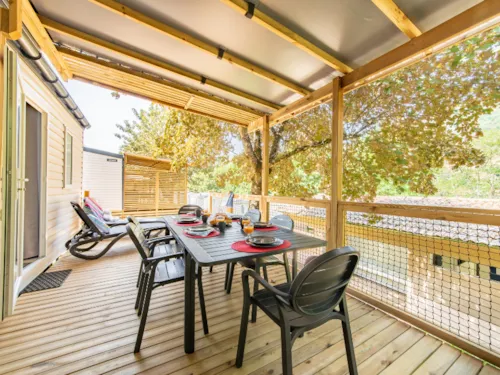 Accommodation - Mobile-Home 30M²- Premium - 2 Bedrooms - Covered Terrace - Clim + Tv + Sheets + Towels Included - image n°4 - Flower Camping Mas de Champel