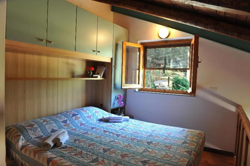 Location - Chalet Avec Veranda - Camping Village Cerquestra