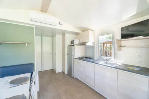 Accommodation - Ciela Confort Mobile Home - 2 Bedrooms - Spa - Lake View - image n°3 - Camping Le Lac Bleu