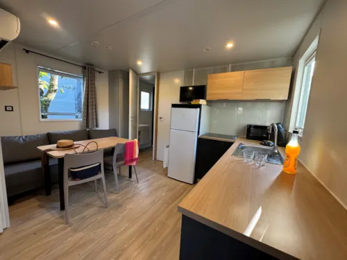 Location - Mobile Home Romarin -  Terrasse Couverte - Climatisation - image n°2 - Camping Les Coudoulets