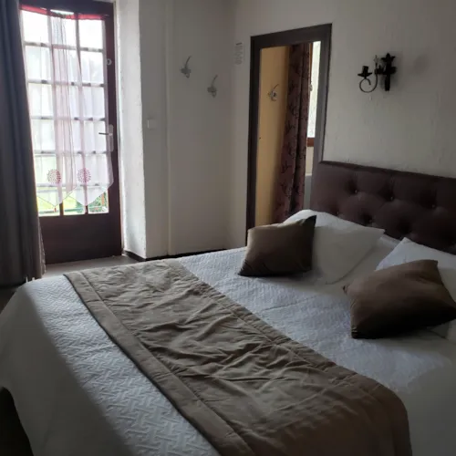 Zimmer - Zimmer Hote 6 Personen - image n°1 - Camping Le Moulin d'Onclaire