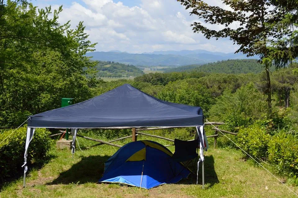 Pitch for car or motorbike and tent