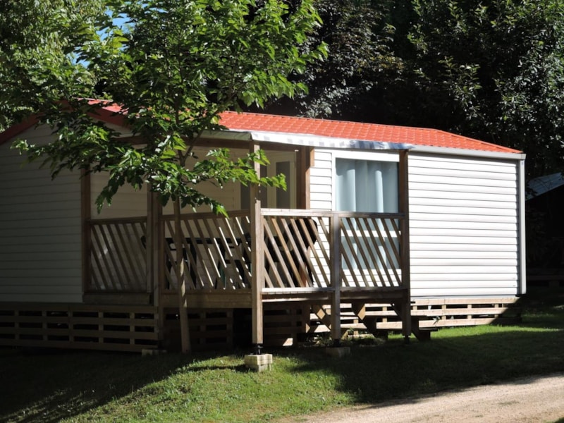 Mobil-home Confort 24 m² (2 chambres - TV) avec terrasse couverte 9 m²