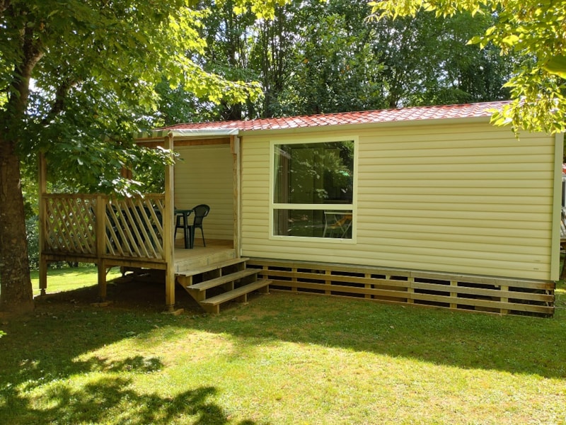 Mobil-home Confort 24 m² (2 chambres -TV) avec terrasse couverte 9m²