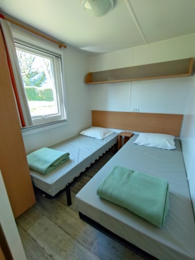 Mobile home Confort 30m² (2 bedrooms-TV) + covered terrace 11 m²
