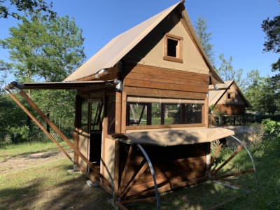 Wooden cabin on piles