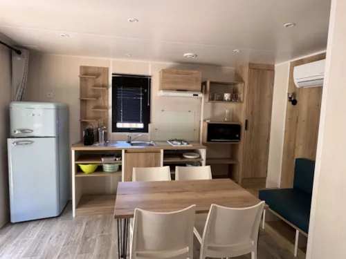 Location - Chalet N°3 Cosy 32 M²  Tout Confort Et Climatisé - image n°2 - CAMPING ISERAND CALME et NATURE***