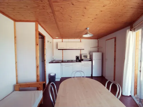 Mietunterkunft - Chalet 42M² (3 Zimmer)  - Klimaanlage - image n°3 - Ushuaïa Villages - Camping Les 4 Saisons ****