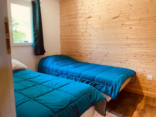 Mietunterkunft - Chalet 35M2 (2 Schlafzimmer) 4 Pers.  - Klimaanlage - image n°4 - Ushuaïa Villages - Camping Les 4 Saisons ****