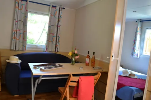 Location - Mobil Home Domino Standard 24M² - 2 Chambres + Tv + Terrasse Semi-Couverte 10M² - image n°4 - Flower Camping LES TRUFFIERES