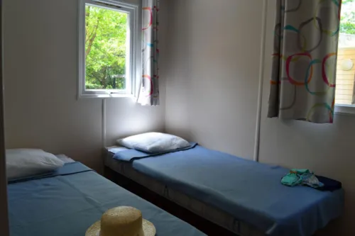 Location - Mobil Home Domino Standard 24M² - 2 Chambres + Tv + Terrasse Semi-Couverte 10M² - image n°7 - Flower Camping LES TRUFFIERES