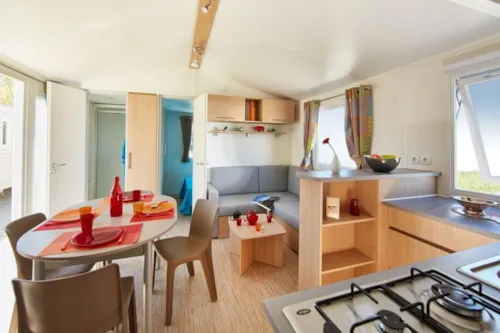 Location - Mobil-Home Confort 33M² 3 Chambres - Terrasse Semi-Couverte - Climatisation - image n°4 - Flower Camping Les Rives de l'Aygues