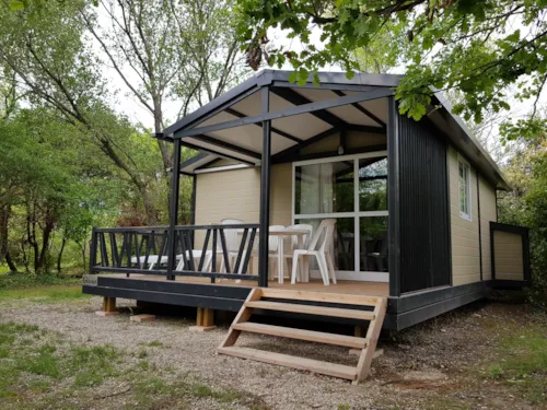 Location - Chalet Confort 25M² 2 Chambres  - Terrasse Couverte - Climatisation - image n°2 - Flower Camping Les Rives de l'Aygues