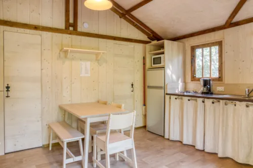Location - Cabane Lodge Bois Sur Pilotis Confort 27M² 2 Chambres - Terrasse Bois Couverte, Zone Ombragée - image n°4 - Flower Camping Les Rives de l'Aygues
