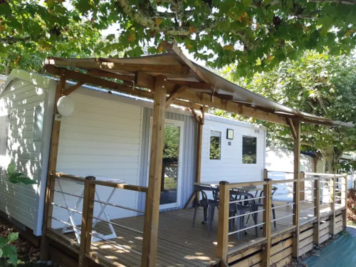 Huuraccommodatie(s) - Stacaravan Tournette 27M² - Half-Schaduwrijk Terras Tv - image n°2 - Camping Le Panoramic