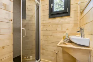 Locatif - Prestige Climatisé 35m² / 2 chambres - Terrasse couverte 20m² - CAMPING LES BASTETS