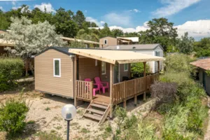 Locatif - Confort climatisé 22 m² / 2 chambres - Terrasse couverte 9m² - CAMPING LES BASTETS