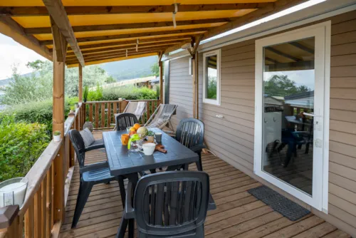 Location - Confort Climatisé 22 M² / 2 Chambres - Terrasse Couverte 9M² - image n°2 - CAMPING LES BASTETS