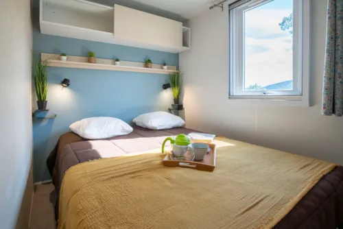 Location - Confort Climatisé 22 M² / 2 Chambres - Terrasse Couverte 9M² - image n°5 - CAMPING LES BASTETS