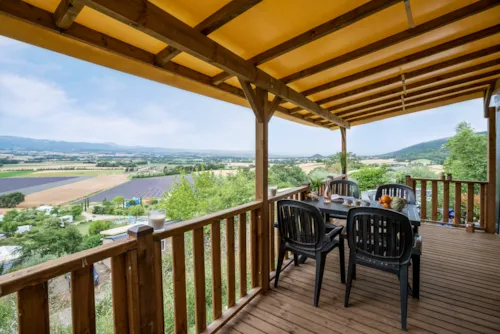 Location - Grand Confort Climatisé 28 M² / 2 Chambres - Terrasse Couverte 15M² - image n°2 - CAMPING LES BASTETS