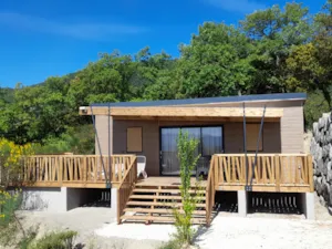 Locatif - Premium Climatisé avec Spa 38m² / 2 chambres - CAMPING LES BASTETS
