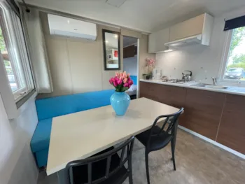 Mietunterkunft - Mobilheim Super Deluxe - Camping Village Punta Navaccia